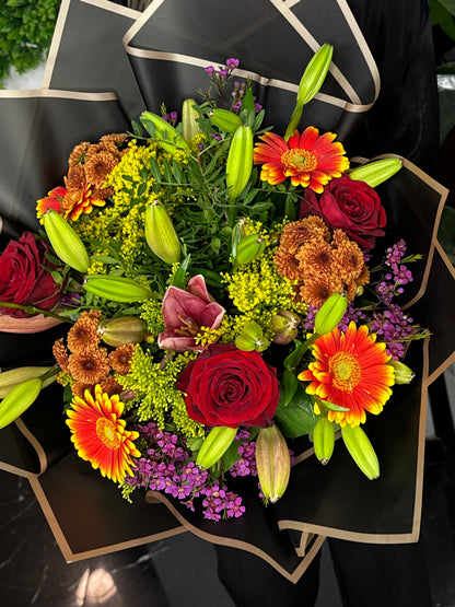 Oranje boeket met leli