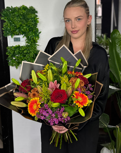 Oranje boeket met leli