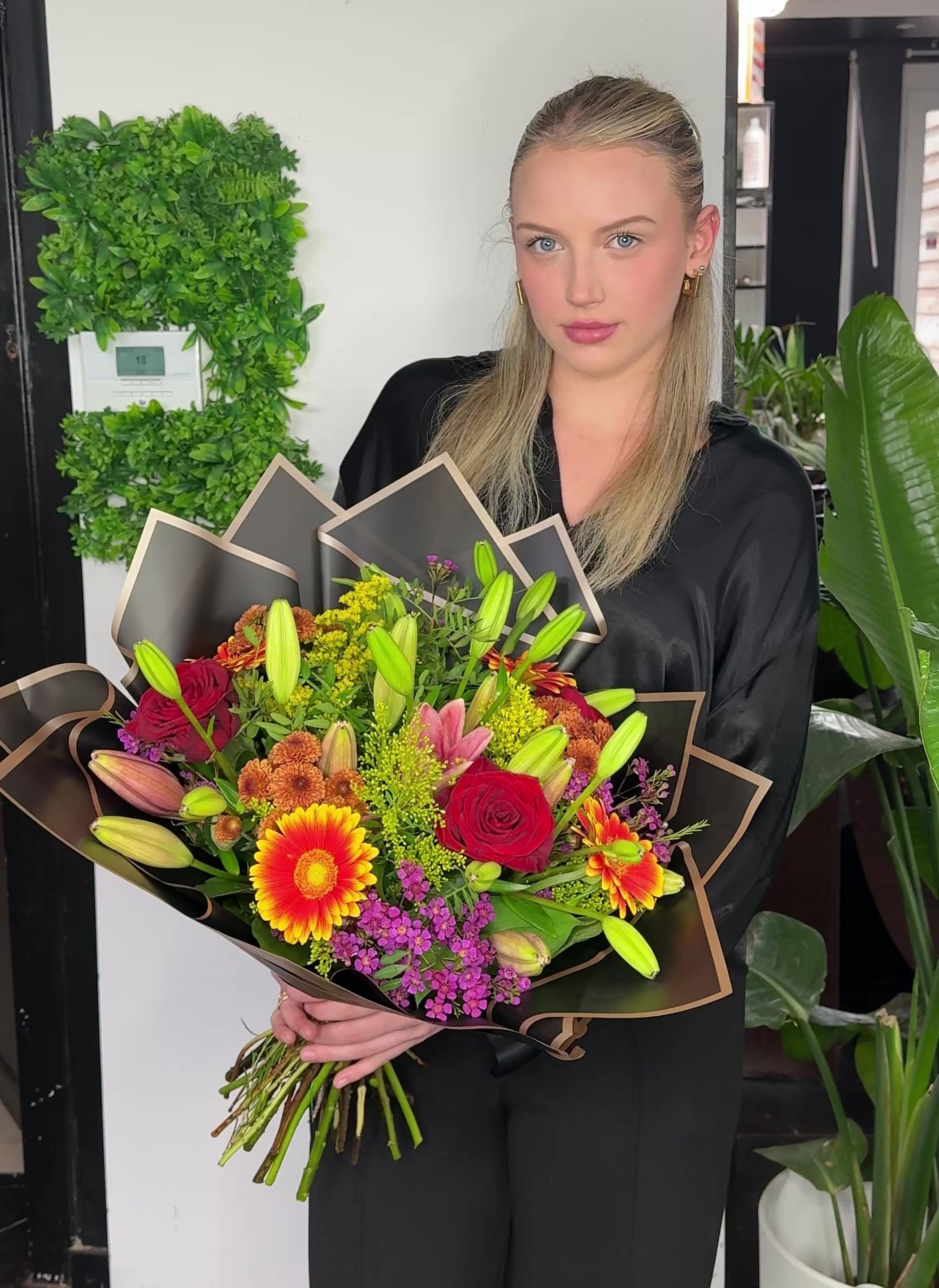 Oranje boeket met leli